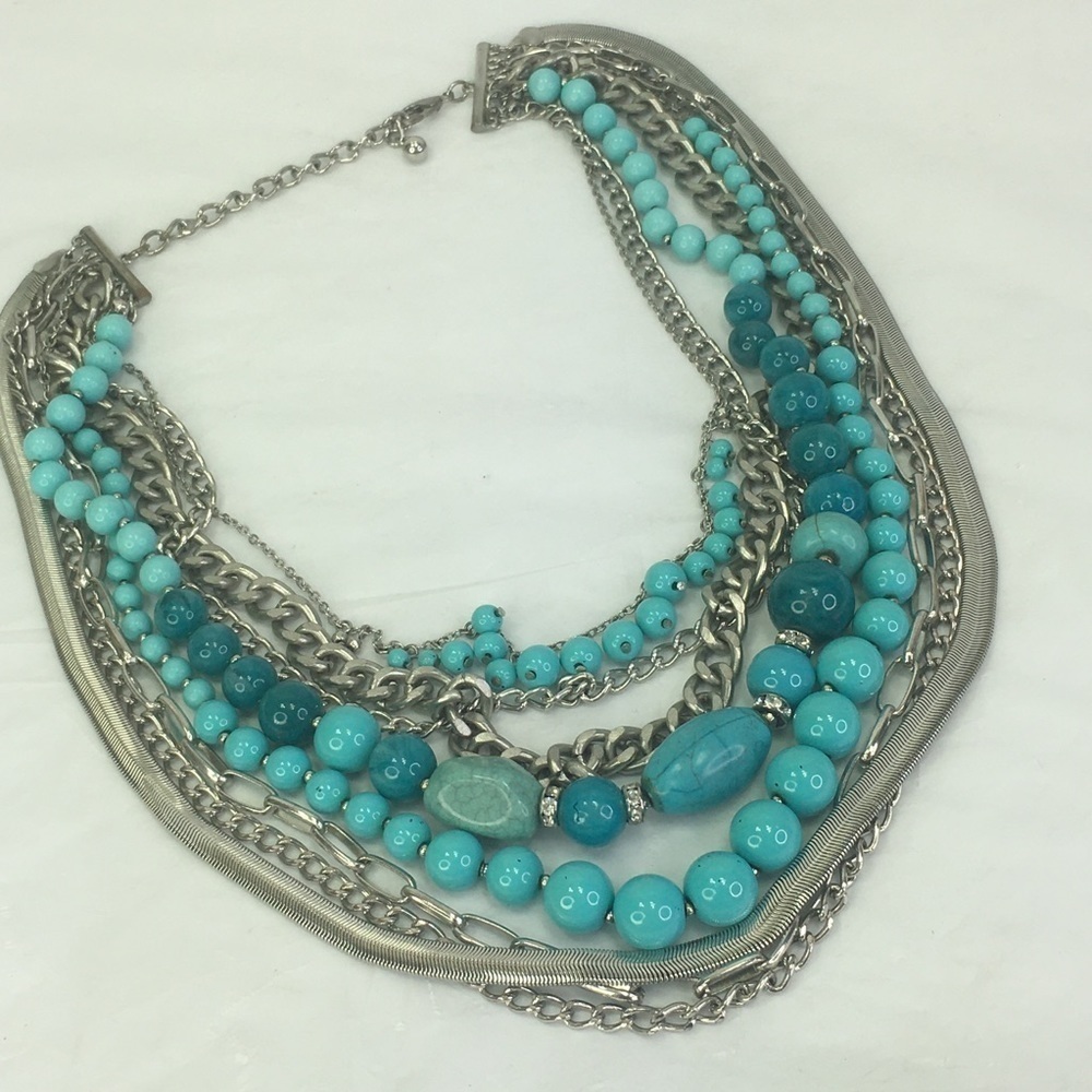 Multi strand blue beaded silver tone metal 8 strand